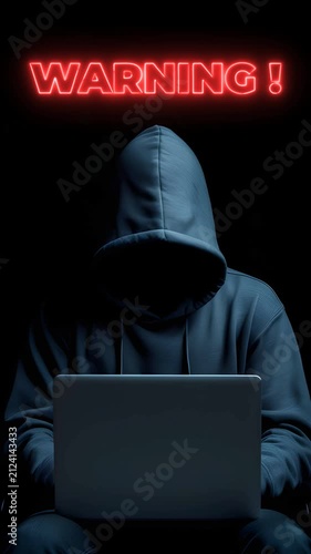 hacker in front of his computer committing digital cybercrime