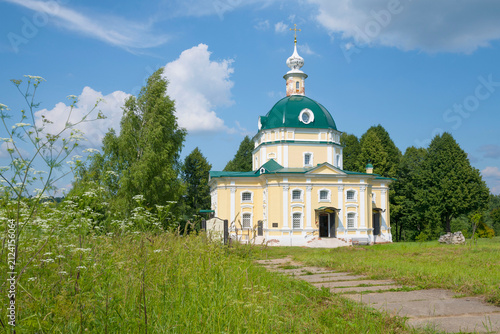 The ancient church of St. Michael the Archangel in a summer landscape on a sunny July day. Tarakanovo manor, Moscow region