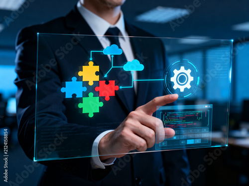 Low code no code development platform concept with professional using stylus on digital interface, application builder tools, cloud integration, and workflow automation for efficient software creation