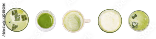 Fresh matcha latte in clear glass isolated on white background with whisk and matcha powder. Iced matcha latte. Japanese green tea drink, creamy milk beverage, healthy antioxidant breakfast. 