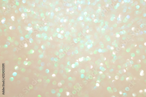 Soft mint bokeh glitter background with pastel sparkle and light shimmer texture for design