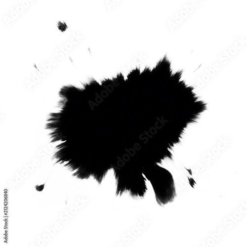 Black ink blot splatter with spray droplets isolated on white background
