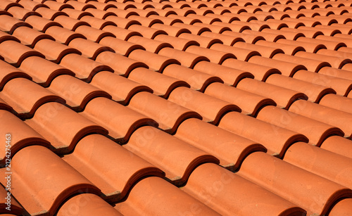 Obraz na plátně Wide angle view of repeating terracotta roof tiles texture