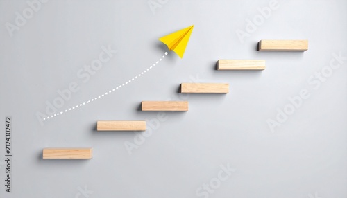 Paper airplane rising above wooden step blocks