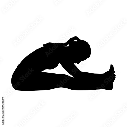 Woman doing yoga stretch in downward dog pose