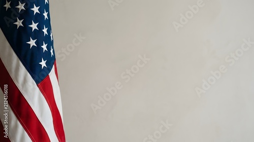 American flag subtly on left edge against a clean soft lit background with large negative space for copy.
