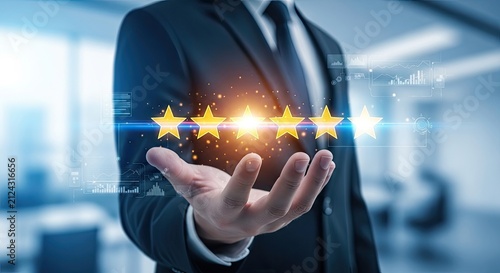 Businessman holding five glowing stars in his hand representing customer service excellence and high quality business rating