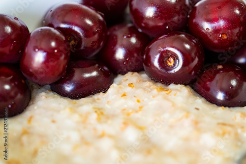 Quadro su tela Oatmeal Porridge with Fresh Sweet Cherries in Bowl