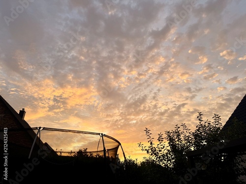 fantastic orange cloudy sky after the sunset