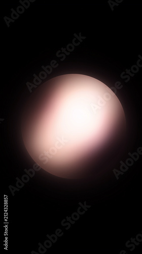 Vertical portrait of a glowing soft orb of warm light on black background. Abstract spherical lens flare gradient. Soft pink and white light effect