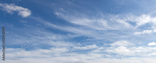 Panoramic blue sky with thin cirrus clouds daytime