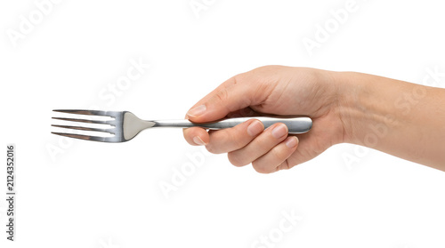 A person's hand holding a fork, implying dining or preparation.