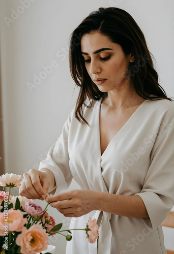 Young woman in a light robe...