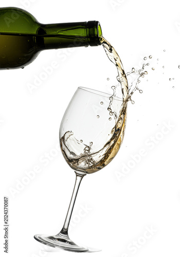 dynamic freeze-frame close-up of brilliant golden amber wine splashing into a crystal glass from a forest-green bottle on a stark white studio background. concept for luxury beverage advertising