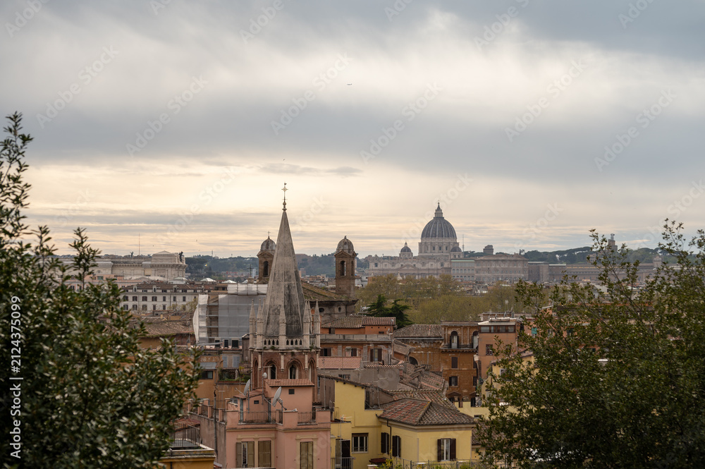 Fototapeta premium City view on roofs and churches of Rome from panoramic route near villas Borghese and Medici, walking in Rome in spring evening, soft sunset lights, guided tour