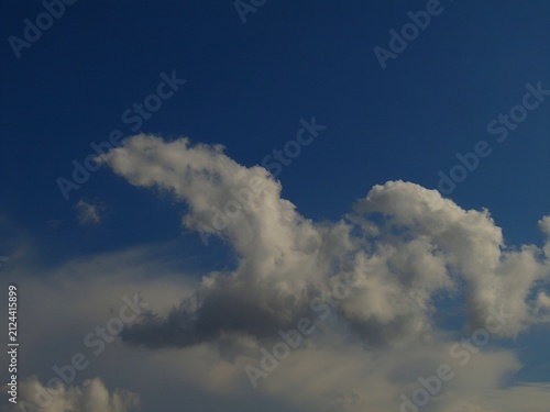 Alto cumulus afternoon Summer cloud group formation.