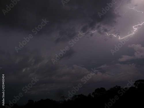 Fotografía Lightning Storm Illuminating the Night Sky in Paraguay