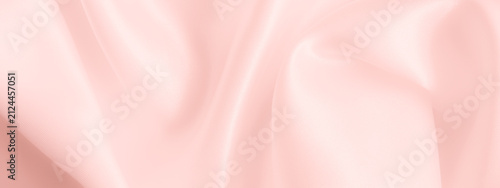 Картината върху платно Soft pink silk satin fabric background with gentle folds