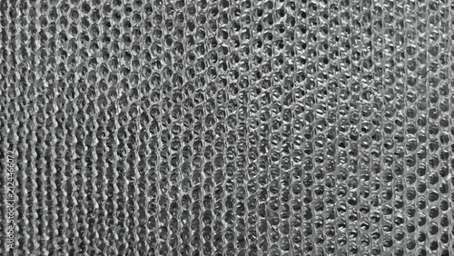 Gray textured vector background of metallic dishwashing fabric. Gray steel wool texture, close-up of tangled metallic fibers forming a rough abrasive surface for cleaning

