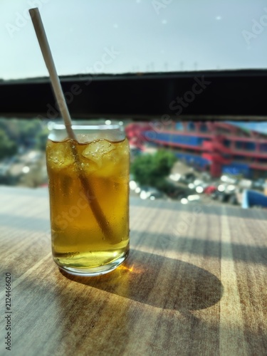 Refreshing Iced Tea with Lemon and Mint on a Sunny Day.