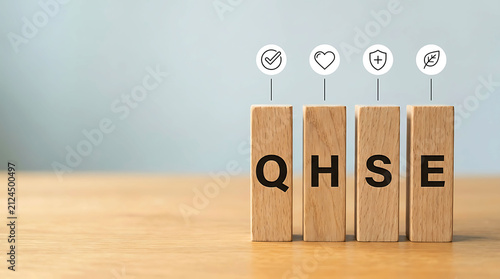 QHSE concept on wooden blocks quality health safety environment