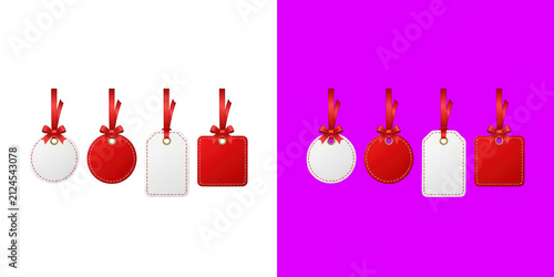 Set of four red and white paper gift tags with ribbons for shopping sale promotion and holiday decoration