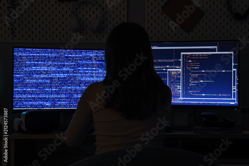 Female programmer working o...