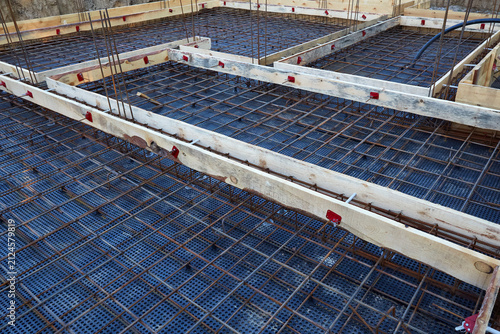 Konstfotografi The construction of a concrete foundation using reinforcing steel prepared at th