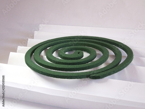 Obraz na plátně A mosquito coil placed on a folded sheet of paper serving as a base