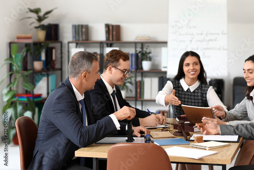 Group of lawyers working at...