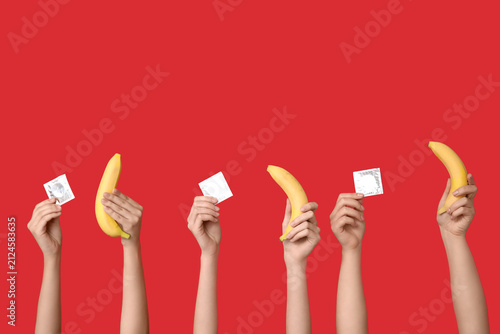 Female hands with bananas a...