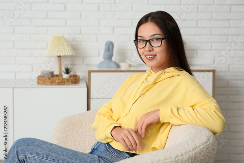 Beautiful young happy Asian...