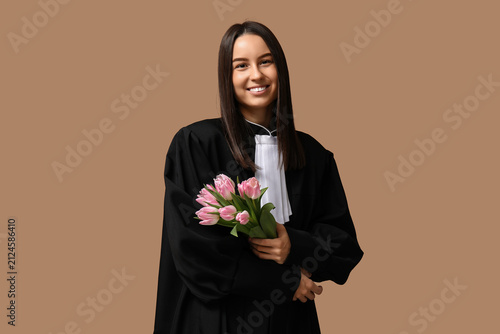 Young female judge with pin...