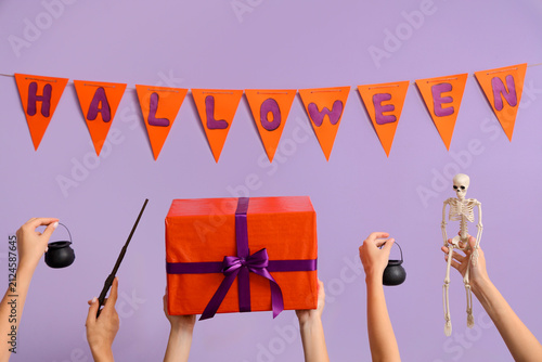 Women with Halloween gift a...
