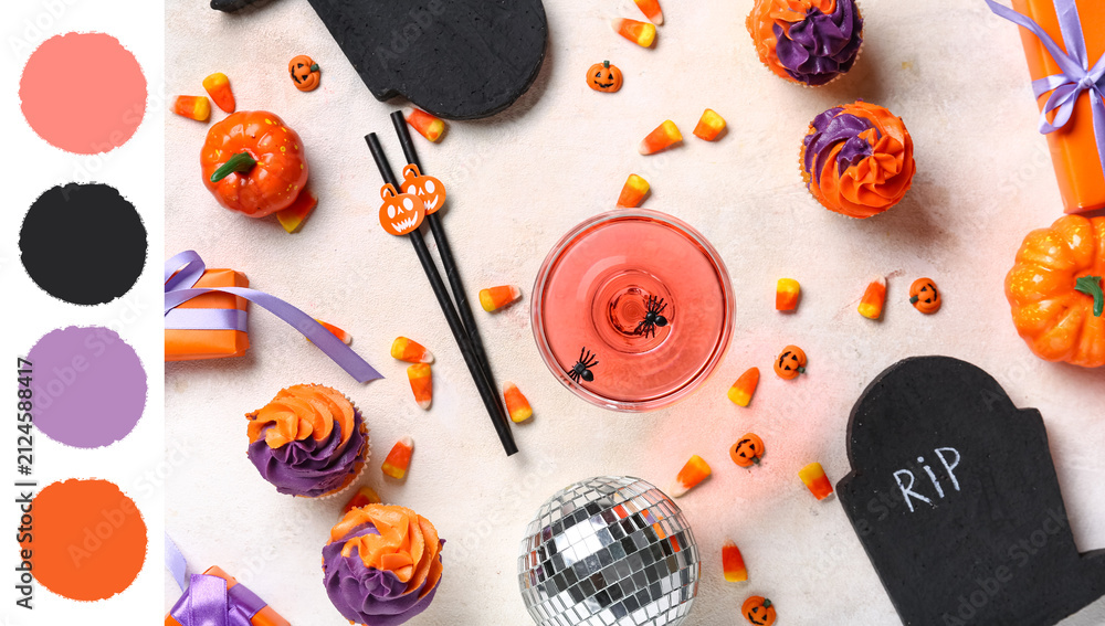 Obraz premium Halloween party decorations with cupcakes and candy