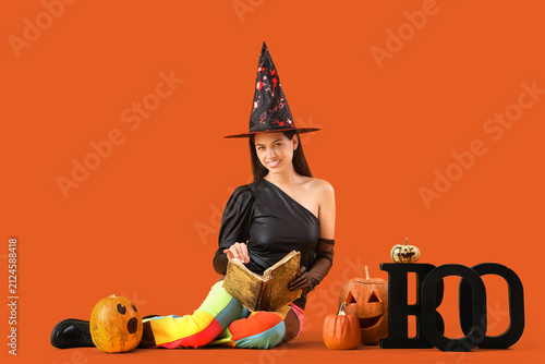 Smiling young woman in witc...
