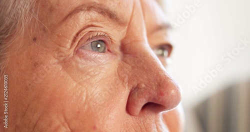 Bild auf Leinwand Thinking, eyes and senior woman in house with insight, daydreaming and nostalgia in calm mindset