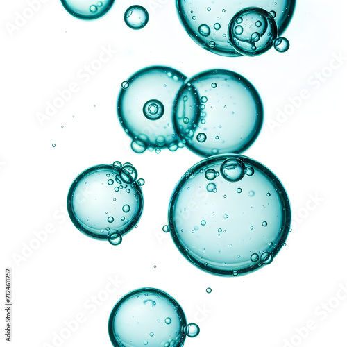 Water droplets forming bubbles in liquid