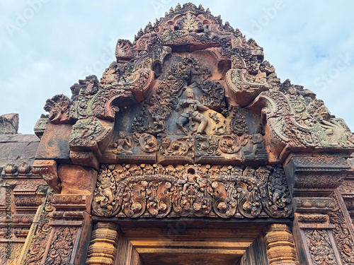 Banteay Srei temple ,Reliefs of the dancing Shiva and  Kali Kalamya,  Third East Tower Gate, World Heritage Site

