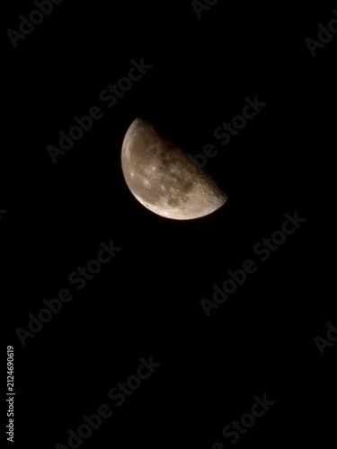 Konstfotografi Half Moon Glowing in the Dark Night Sky