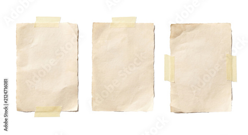 Three blank vintage paper sheets taped with masking tape, isolated on white background for scrapbook, memo and retro collage design