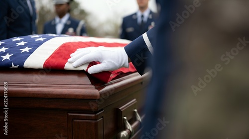 Honor guard touching coffin with flag. Military funeral service with soldier in uniform.