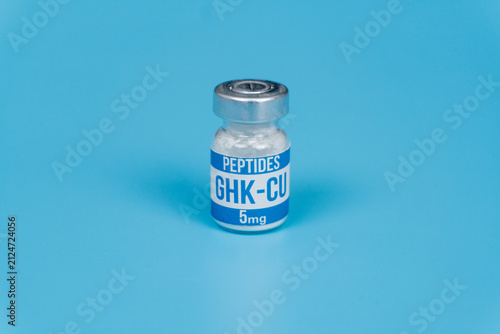 GHK-CU Peptide Vial 5mg on Blue Background, Studio Product Shot