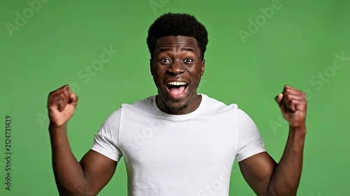 Hopeful Reaction Turning into Celebration Against Chroma Key Green Background