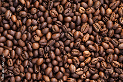 Arabica coffee beans from Cuba, macro. Coffee background.