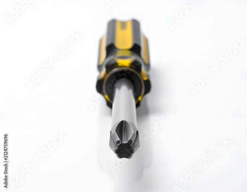 Yellow and black phillips head screwdriver on white.