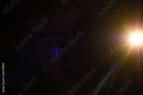 Sun flare on the black background