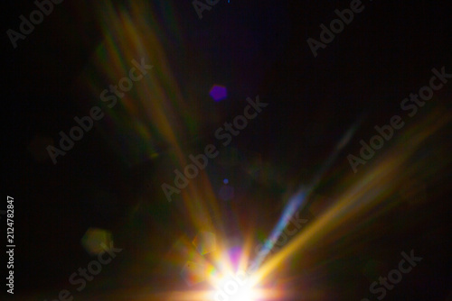 Sun flare on the black background