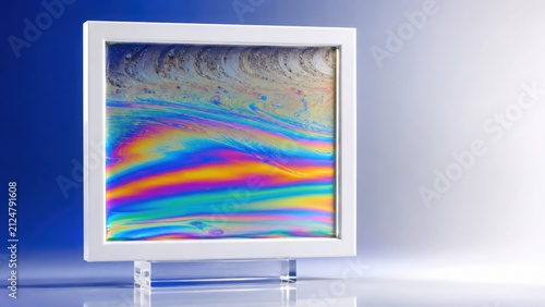 Soap Film With Rainbow Interference Patterns in Clear Frame