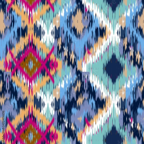 A vibrant modern Ikat bohemian seamless pattern featuring overlapping geometric diamond and zigzag shapes. The design stands out with its distinct fuzzy, brush-stroke edges that mimic traditional hand